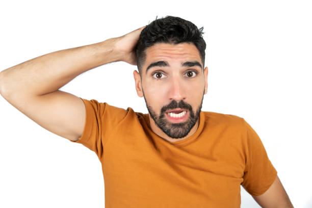 istock Portrait of young man looking worried. 1287723077