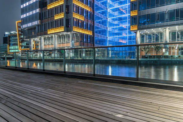 istock Wooden paltform front of modern building 1287723409