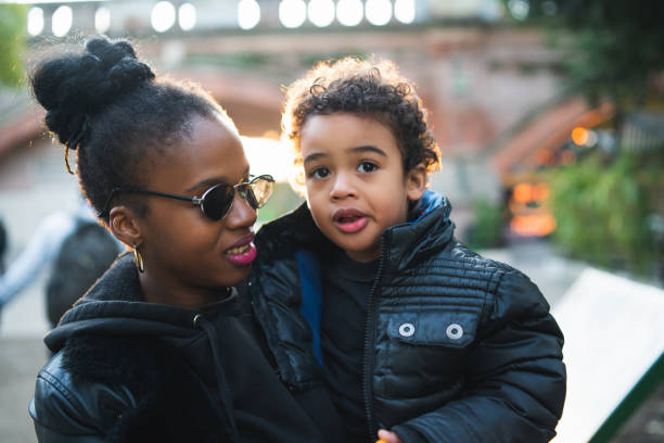 istock African american mother with his son. 1287726858