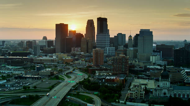 istock Drone Shot of Sun Rising Behind Downtown Minneapolis 1287727802