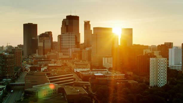 istock Rising Sun Shining Between Minneapolis Office Towers 1287727867