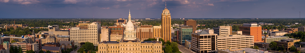 Stitched panoramic shot of Lansing, including the Michigan State Capitol from the air.