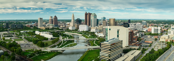 Stitched panoramic shot of Columbus, Ohio on a summer afternoon from the air.