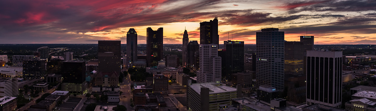 Stitched panoramic shot of Columbus, including the Ohio Statehouse, at twilight from the air.