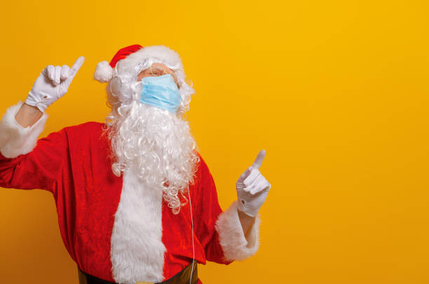 istock Santa Claus in face mask during Covid-2019 1287731714