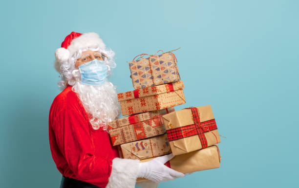 istock Santa Claus in face mask during Covid-2019 1287731767