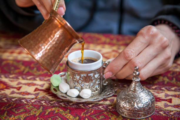 istock silver set for Turkish coffee, Turk for coffee. Traditional handmade sets. Teapot and cups for coffee, selective focus 1287739571