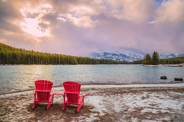 istock Adirondack Chairs Overlooking Two Jack Lake At Sunrise 1287756941