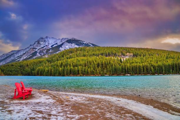 istock Adirondack Chairs Overlooking Two Jack Lake At Sunrise 1287756968