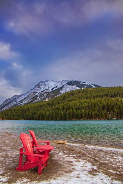 istock Adirondack Chairs Overlooking Two Jack Lake At Sunrise 1287757060