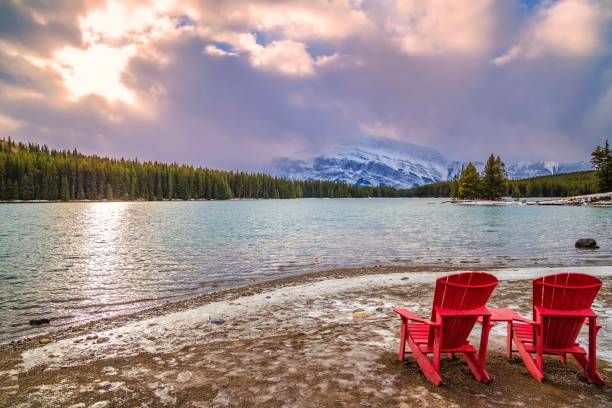 istock Adirondack Chairs Overlooking Two Jack Lake At Sunrise 1287757240