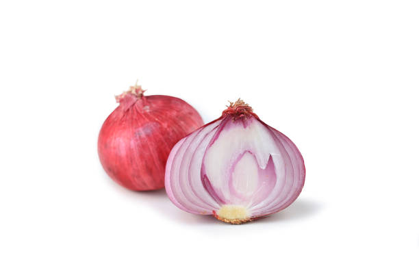 istock Red sliced onion isolated on white background 1287764074