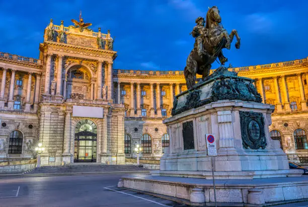 The Prinz Eugen Statue with part of the Hofburg in Vienna at night