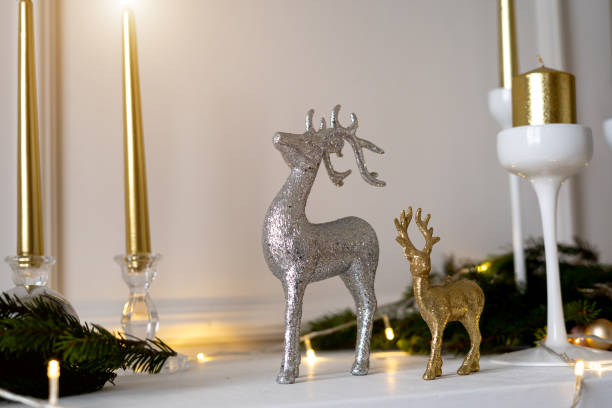 istock Christmas deers are standing under a Christmas tree. 1287779550