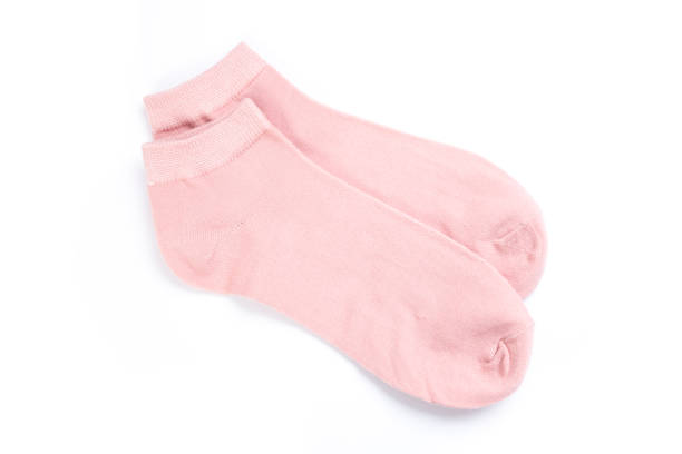 istock Pair of cute short socks on white background, top view 1287785102