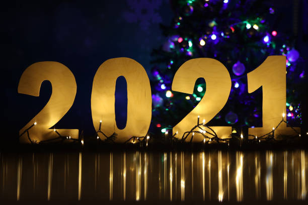 istock Number 2021 on the background of the Christmas tree 1287789886