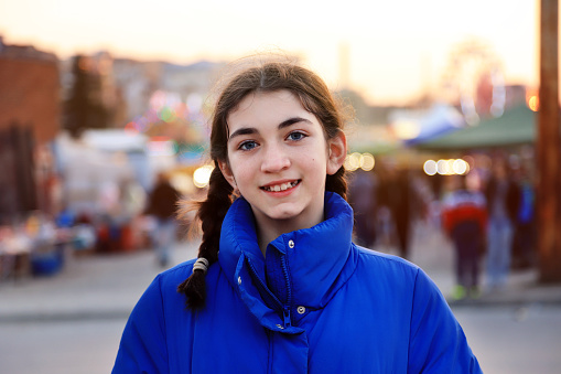 Portrait of a young girl  in amusement park