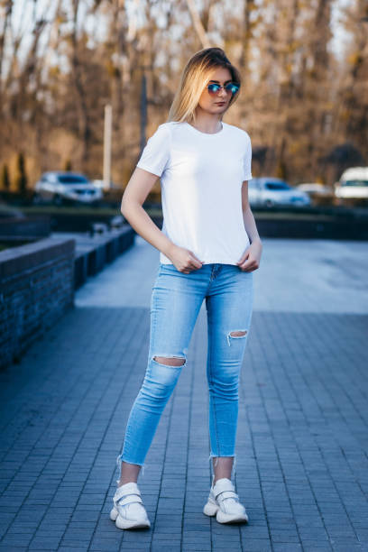 istock Young model girl in white t-shirt 1287795277