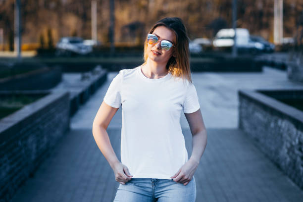 istock Young model girl in white t-shirt 1287795295