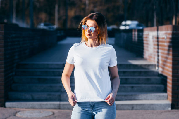 istock Young model girl in white t-shirt 1287795317
