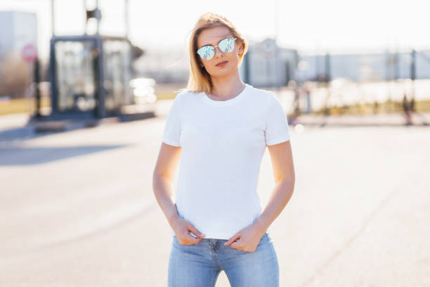 istock Young model girl in white t-shirt 1287795331