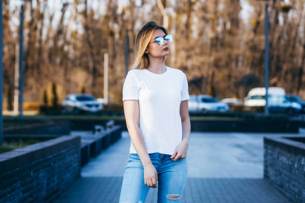 istock Young model girl in white t-shirt 1287795405