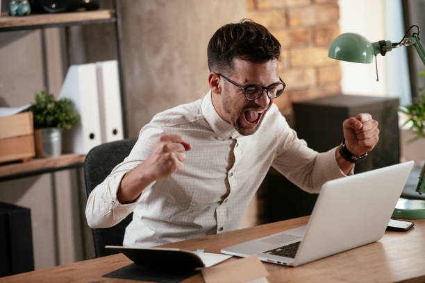 istock Businessman working in the office on his laptop. 1287800029