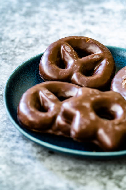 istock Chocolate Covered Gingerbread Cookies Heart and Star Shaped in Plate. 1287800046