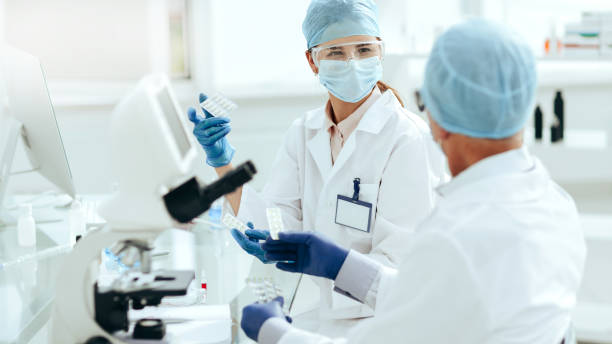 istock scientists are conducting research on a new drug 1287801835