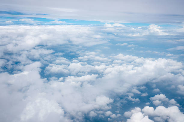 istock Take pictures of clouds in the sky while flying 1287802535