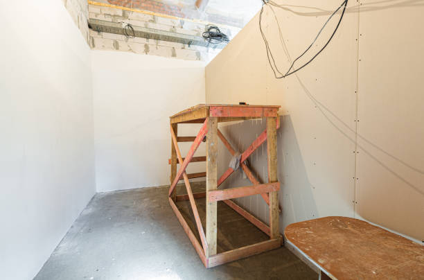 istock Wooden board in room and construction tools are in an apartment during on the construction,overhaul, remodeling, rebuilding, home improvements and renovation. 1287805105