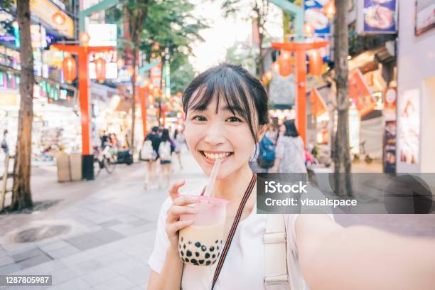 Young Asian Woman Taking A Selfie Stock Photo - Download Image Now - Influencer, Asian and Indian Ethnicities, Bubble Tea