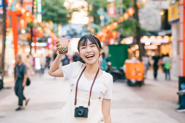 istock Taiwanese woman with bubble tea 1287806019