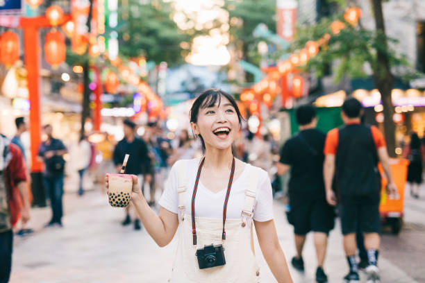 istock Taiwanese woman with bubble tea 1287806023