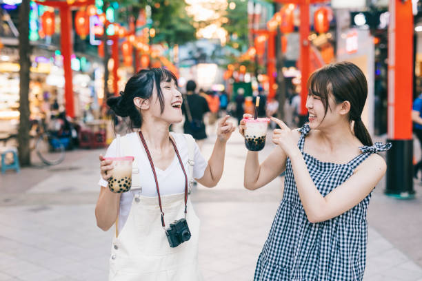 istock Happy Asian women with bubble tea 1287806025