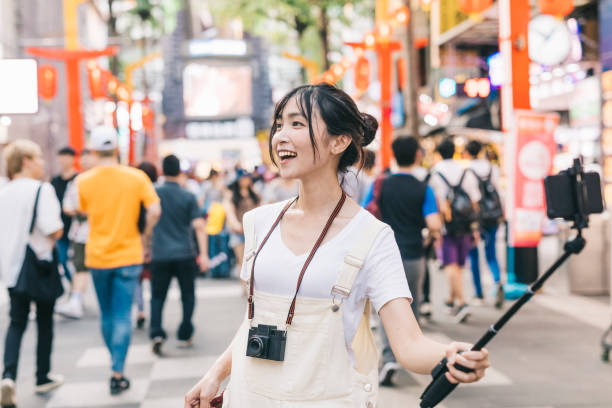 istock Young asian influencer vlogging in the city 1287806036