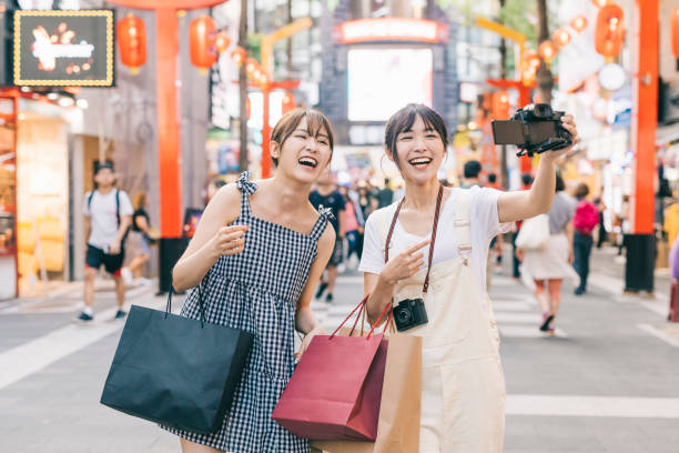 istock Asian influencers making a vlog in the city 1287806079