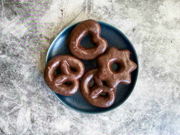istock Chocolate Covered Gingerbread Cookies Heart and Star Shaped in Plate. 1287806630