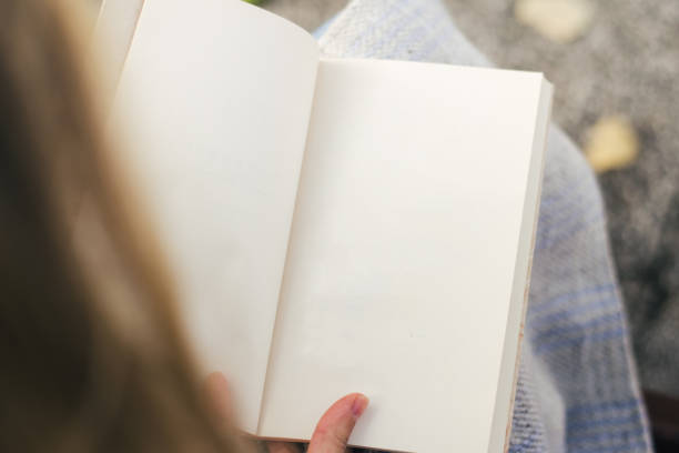 istock Looking at a blank page stock photo 1287806642