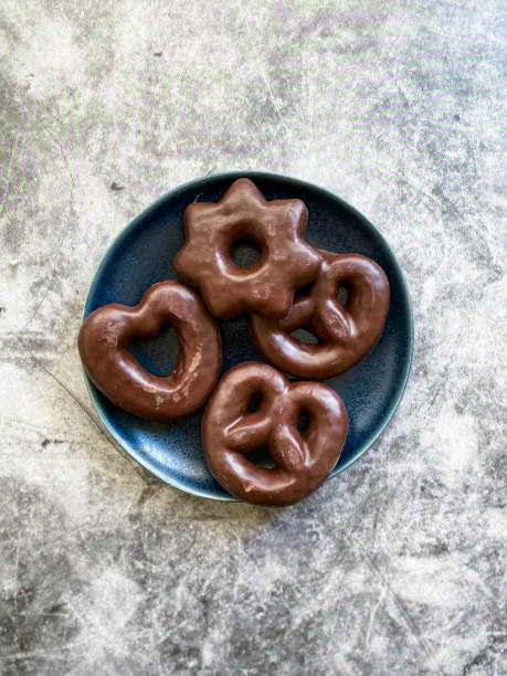istock Chocolate Covered Gingerbread Cookies Heart and Star Shaped in Plate. 1287808029