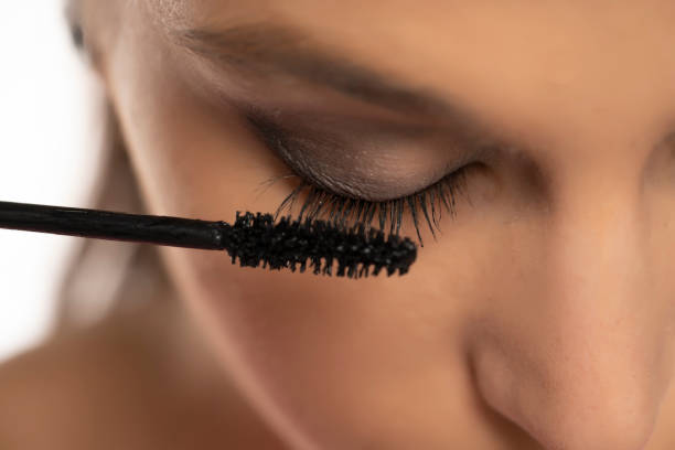 istock mascara applying on female natural eyelashes 1287808416