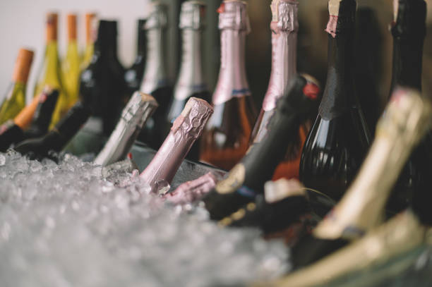istock Champagne and wine bottle in ice 1287812694