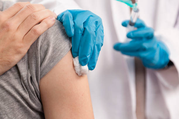 istock Vaccine and pandemics stills with people on a clinic environment. 1287814606