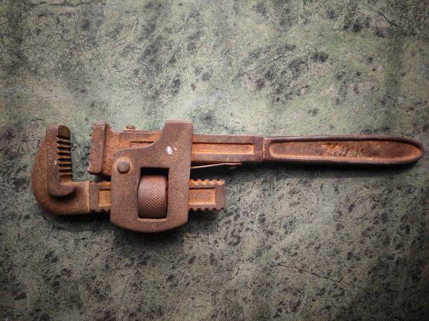 istock pipe wrench rusted old metal lying on the floor tool equipment 1287818075