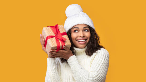 istock African American Woman Shaking Present At Studio 1287820905