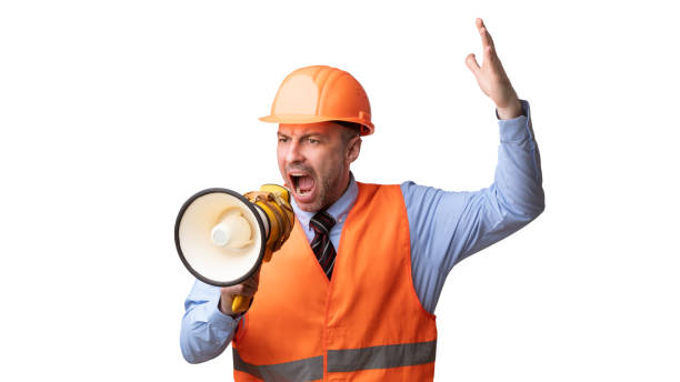 istock Angry Housebuilder Shouting In Megaphone Standing Over White Background, Panorama 1287821478