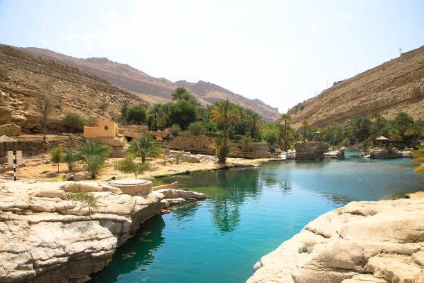 istock Water pools in Wadi Bani Khalid, Oman, Arabia 1287821618