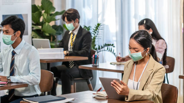 istock Business in new normal at office 1287822267