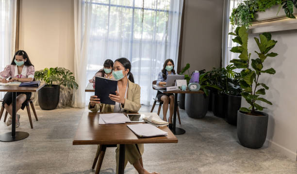 istock Business in new normal at office 1287822465