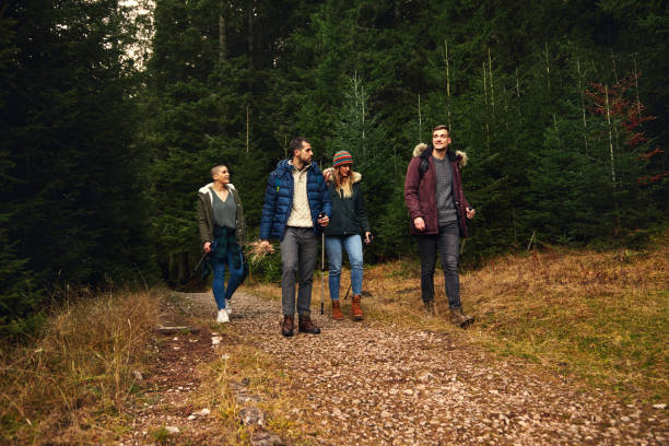 istock Four Friends Hiking In Autumn 1287825778
